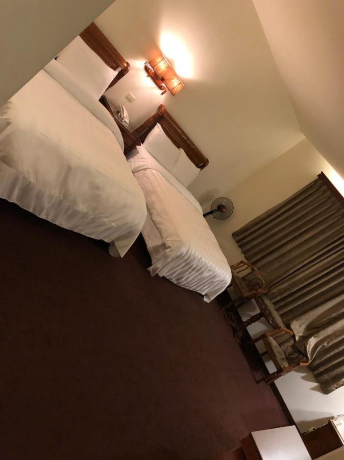 England Business Motel Yilan Экстерьер фото